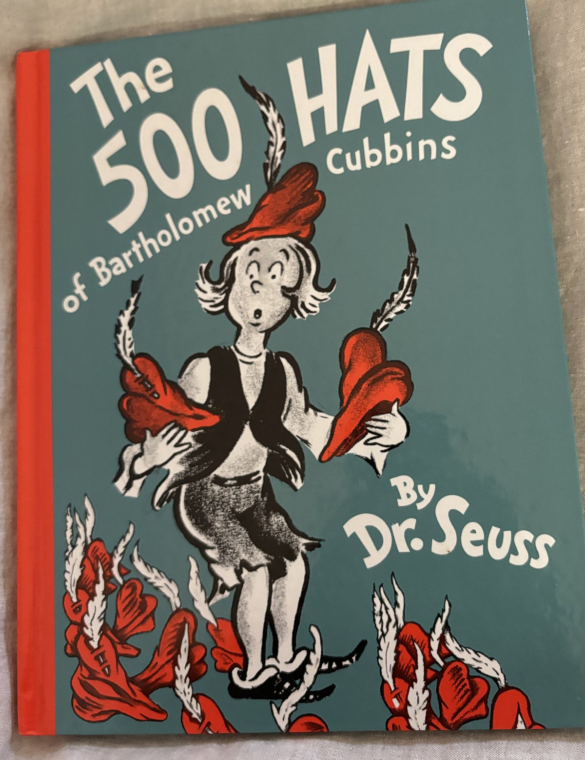 The 500 Hats of Bartholomew Cubbins by Dr. Seuss